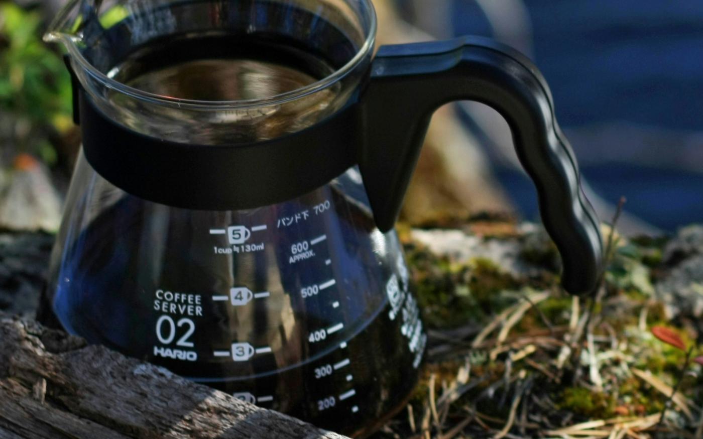 a coffee pot with scrabbles spelling hello august by Elin Melaas courtesy of Unsplash.