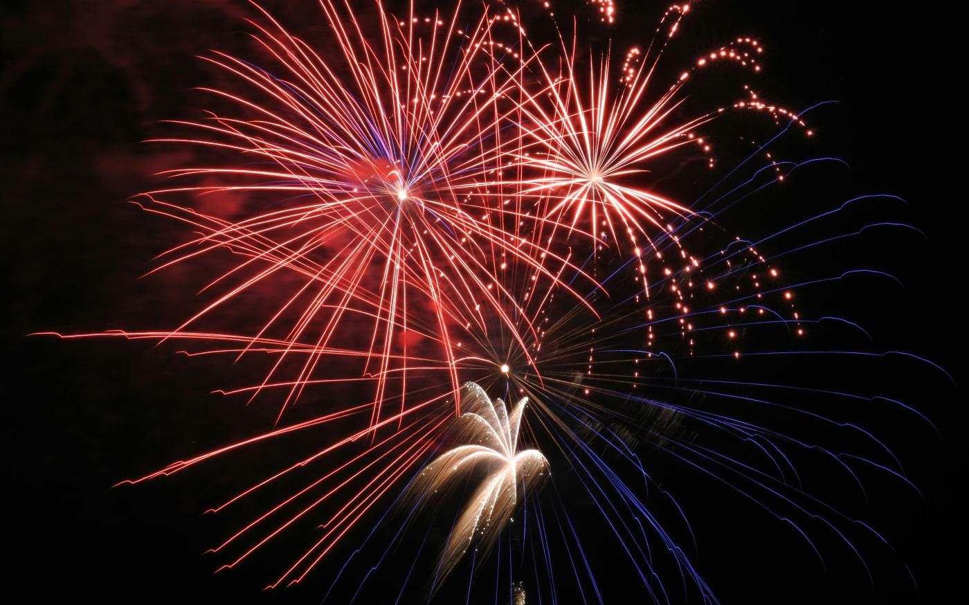 fireworks in black sky by Jim Strasma courtesy of Unsplash.
